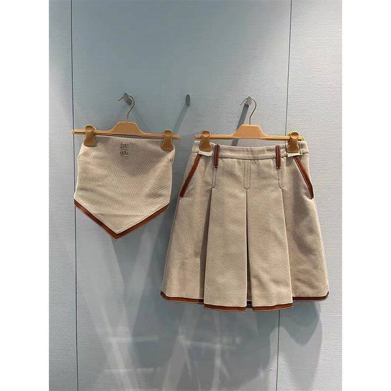 高端女装夏季皮扣设计感抹胸上衣+压褶半身裙套装