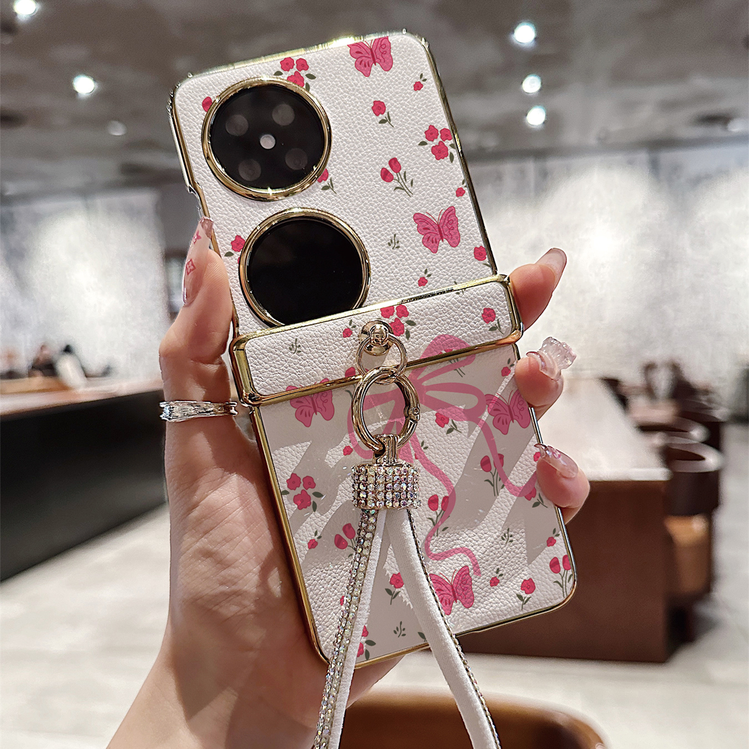 粉花蝴蝶结皮纹折叠屏手机壳