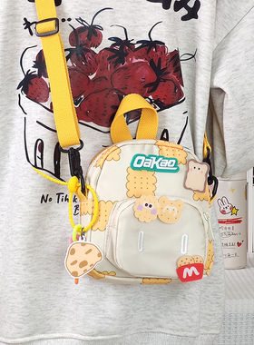 儿童帆布小包2025新款学生手机包可爱女孩休闲小众迷你单肩斜挎包