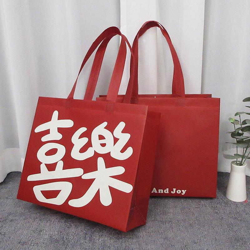 新年安可拉红购物袋服装店手提袋子女装衣服无纺布袋子婚庆礼品袋