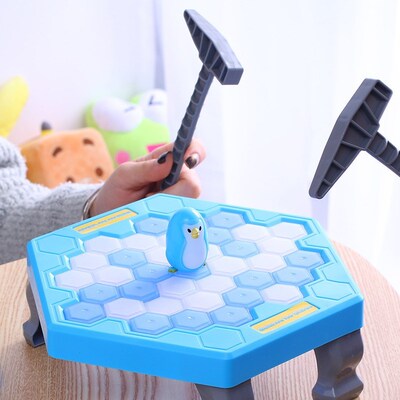 Break the ice Penguin children's puzzle game on ice bloc