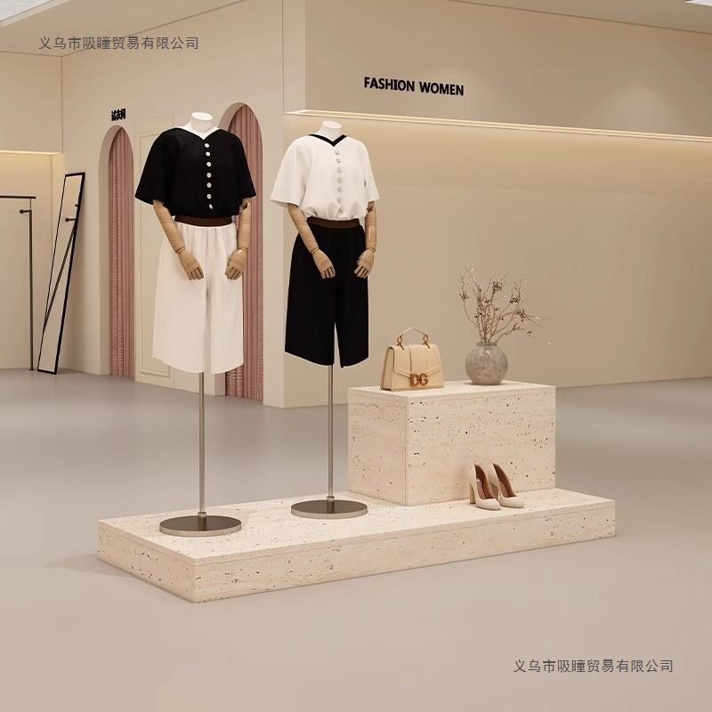 服装店展示柜简约现代中岛台洞石纹女装陈列柜橱窗地台摆放模特