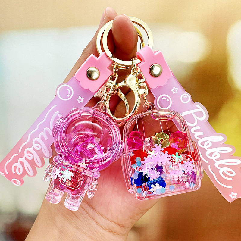 新品 卡通宇航员流沙瓶钥匙扣摆摊小礼品漂浮入油液体钥匙链