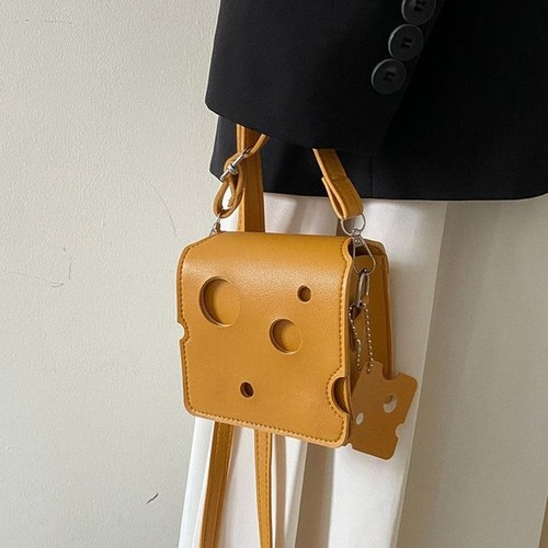 小众设计2025新款潮可爱迷你洞洞奶酪三角口红耳机斜挎零钱小方包