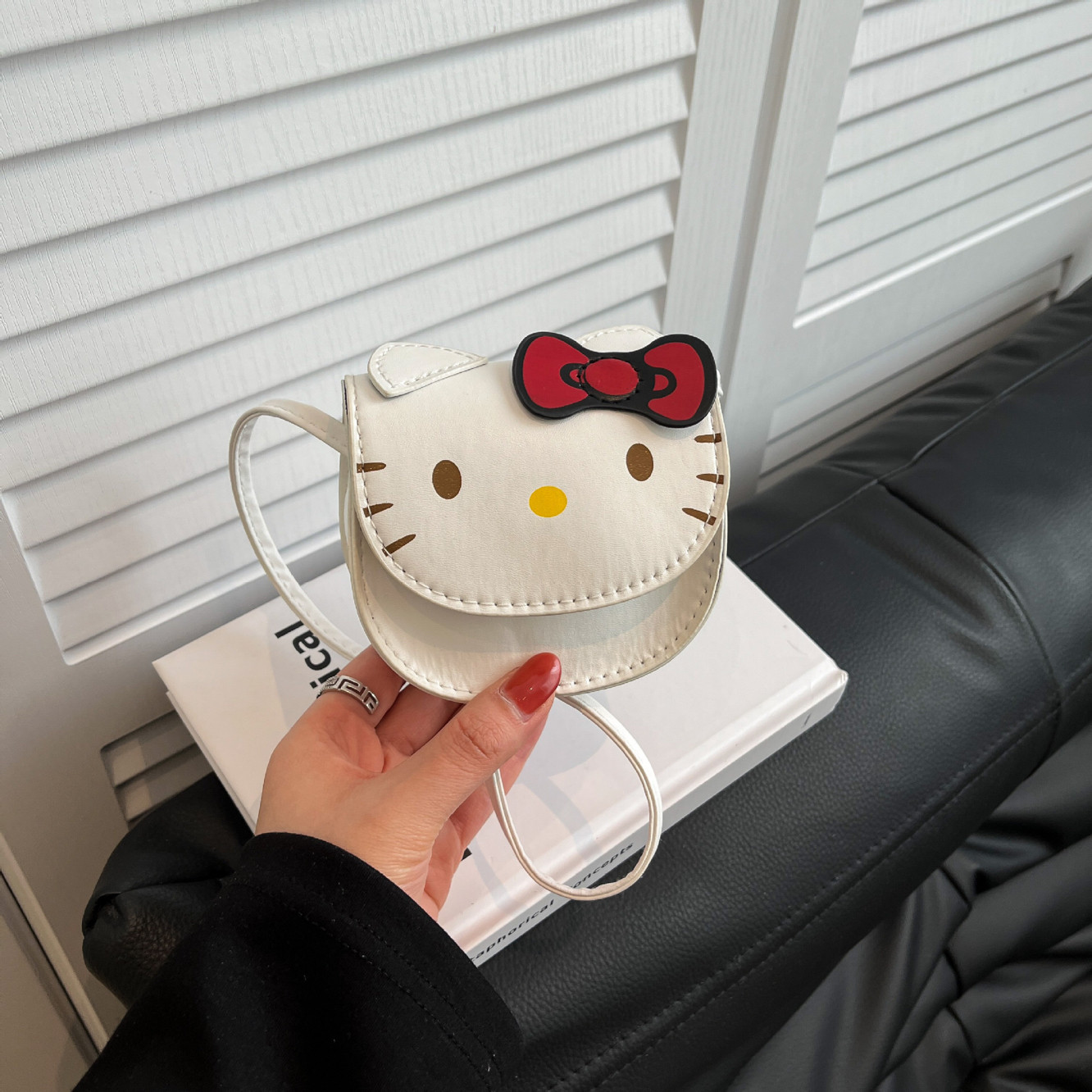 HelloKitty迷你零钱包女凯蒂女可爱小包挂件凯蒂猫耳机斜挎包包
