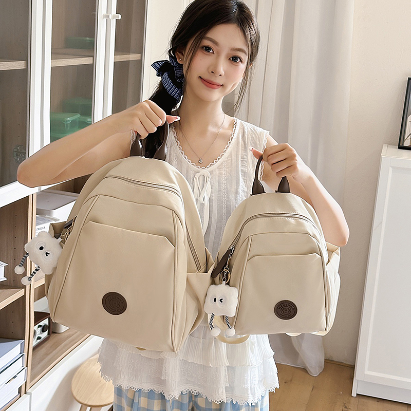 日系简约双肩包女复古休闲通勤包