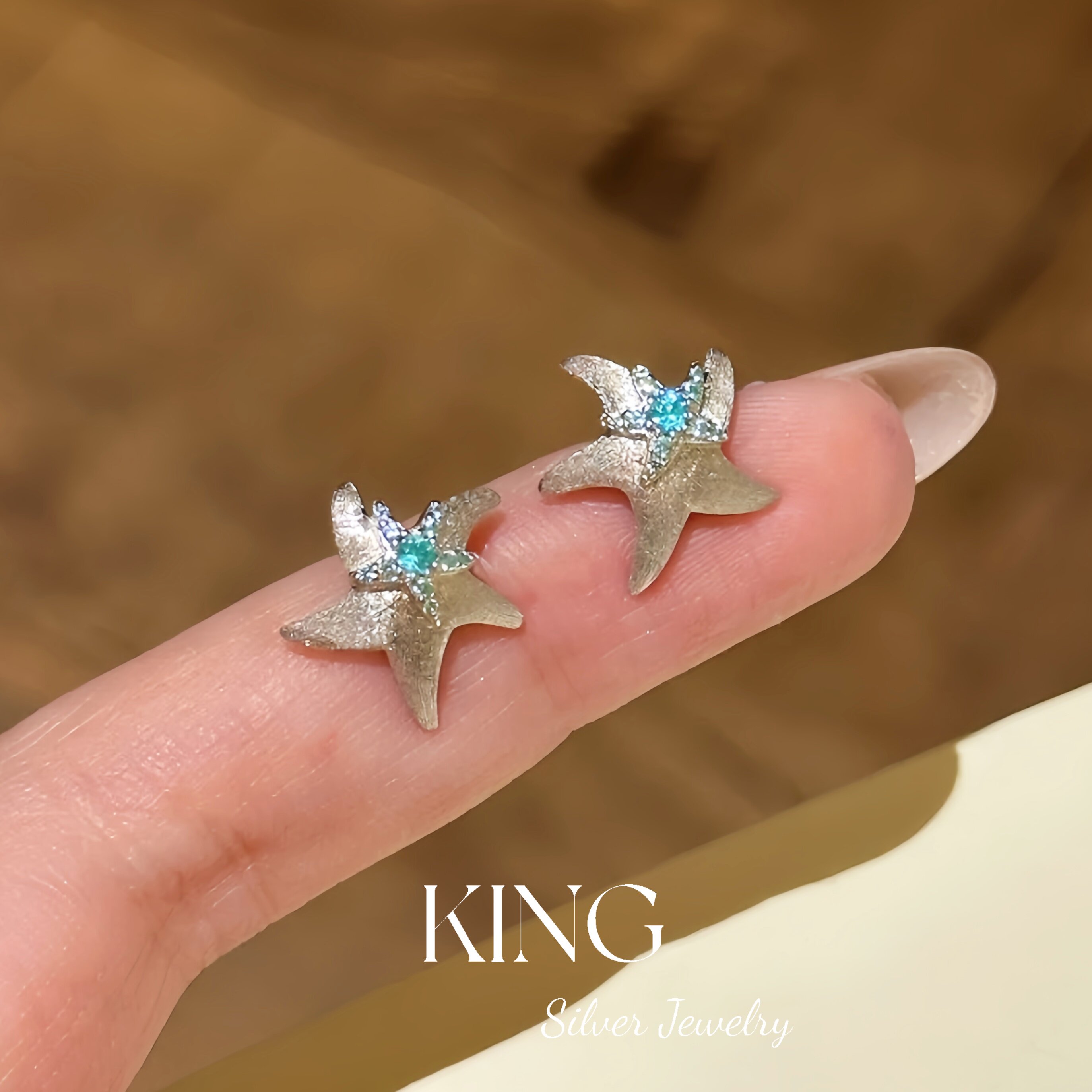 king银饰珠宝S925银海星派对耳钉
