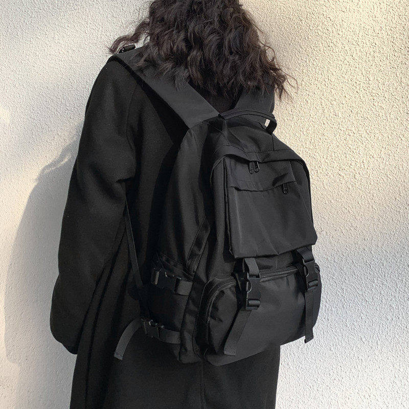 法国DEKCLK户外纯黑色双肩背包大容量牛津布旅行大学生原宿书包女