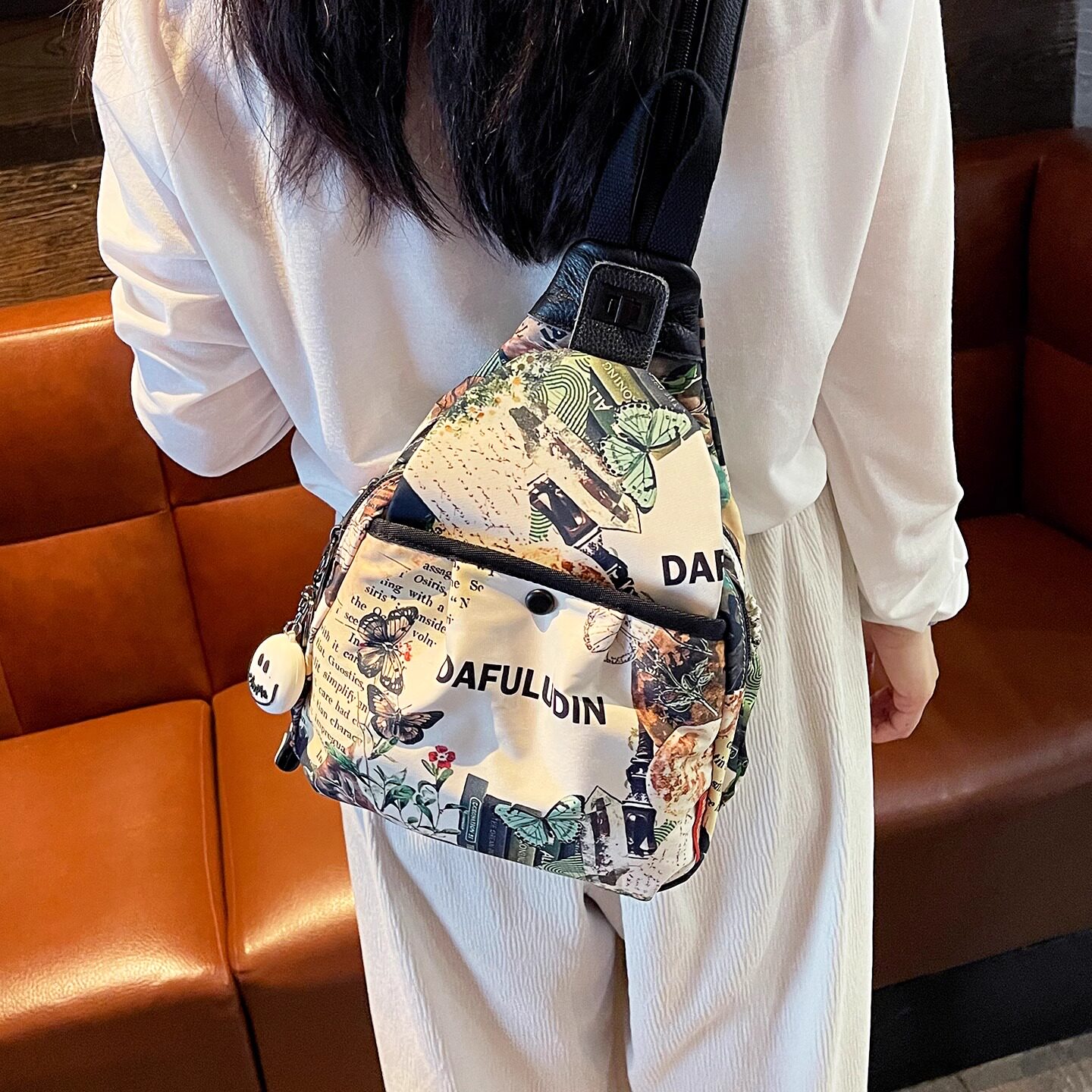 法国DUDK品牌清新印花双肩包女新款时尚休闲牛津布胸包旅行登山包