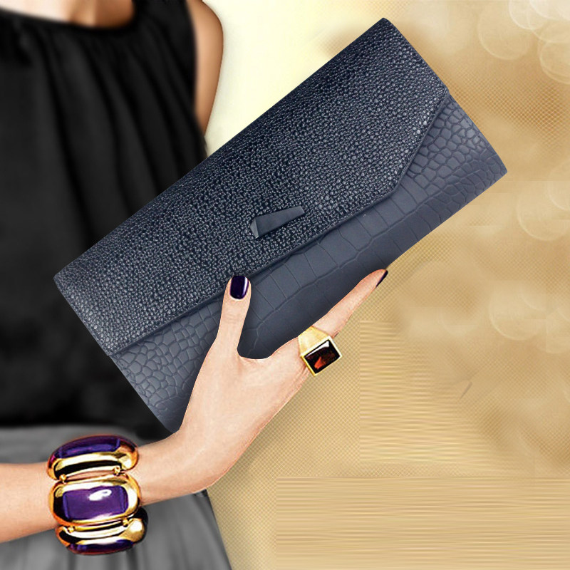 高端女士真皮手拿包女包2021新款夏季手抓时尚气质手包斜挎小包包