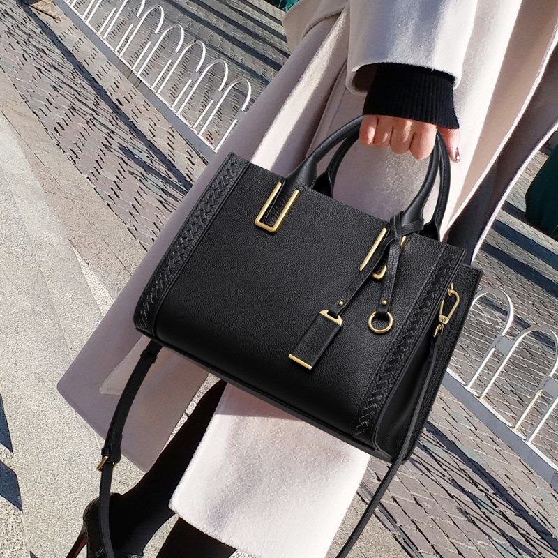 真皮包包女士2025新款潮高级感时尚通勤女包手提包黑色单肩斜挎包