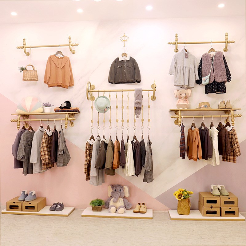 童装店展示架简约壁挂式金色陈列架组合上墙铁艺挂衣架服装店货架