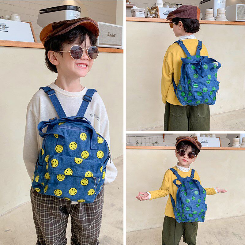 儿童书包幼d儿园女孩卡通背包男童韩版牛仔布百搭潮宝宝笑脸双肩
