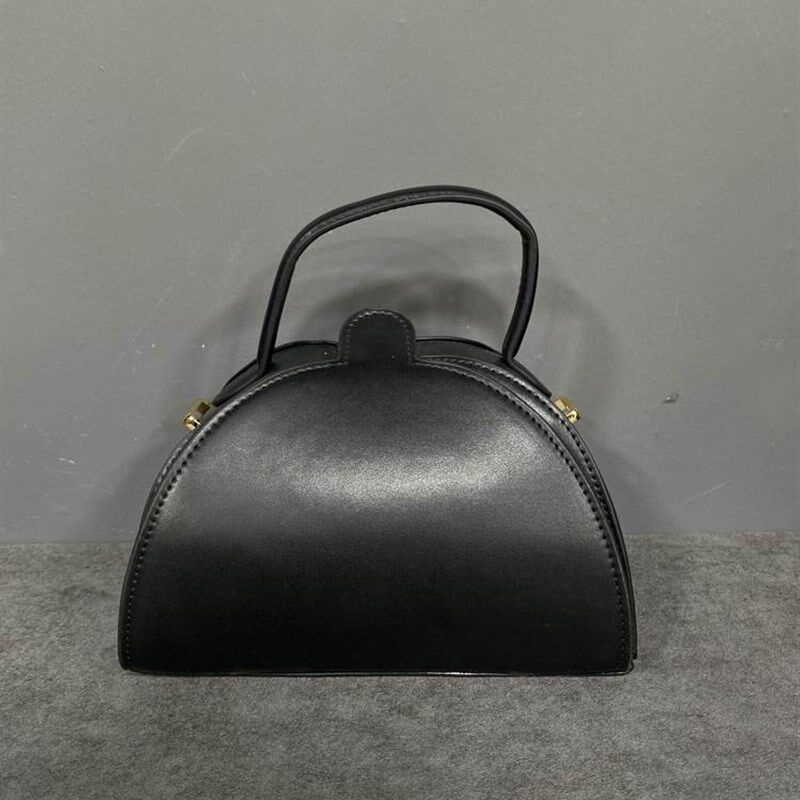 样板房女士包包衣帽间摆件衣柜装饰品黑色流苏手提包水桶包手拿包