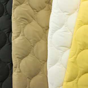 新款直销夹棉绣花面料涤纶秋冬衍缝棉服波浪葫芦绗棉布箱包设计师