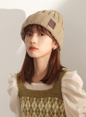 冬季保暖护耳针织帽女生时尚贴布锥顶套头帽子百搭卡杏色毛线帽男
