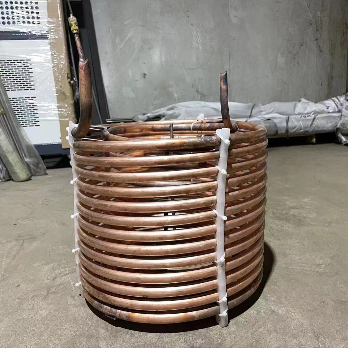 东华铜管蒸发器不锈钢钛管圆形换热器工业冷水机制冷铜盘管蒸发器图片