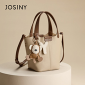 卓诗尼2025新款 水桶包女单肩手提包大容量通勤小狗包包上班专用包