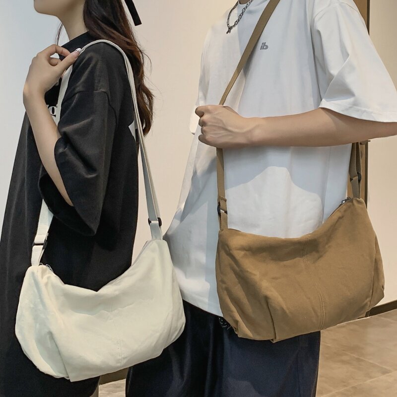 日系斜挎包女简约休闲大容量饺子包运动百搭单肩包男休闲通勤背包