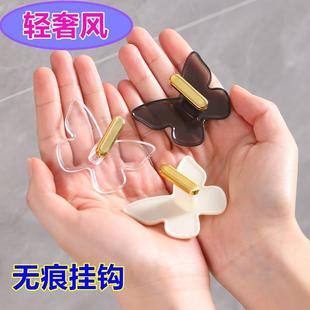 蝴蝶挂轻钩奢挂钩浴室打孔强力承重厨跨房门后包免包挂钩 境新款