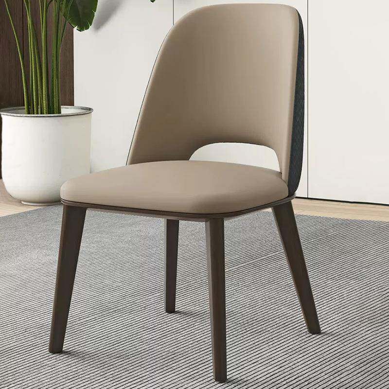 实木餐椅新款家用北欧意式真皮黑色白蜡木轻奢高级感酒店民宿椅子