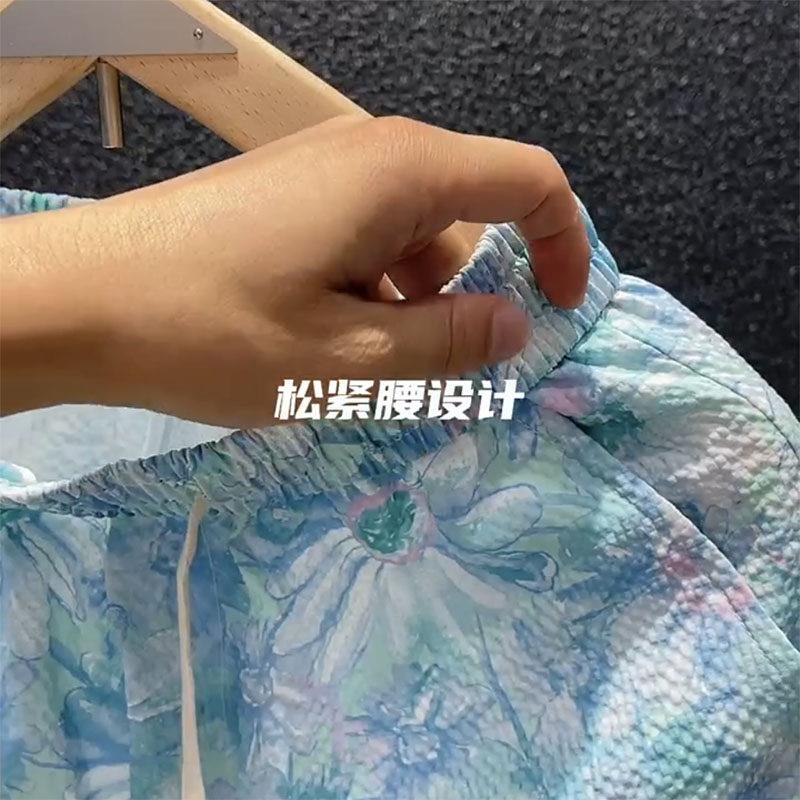 欧洲站~潮流吸!雏菊碎C-JM3048花短裤男夏季印花薄睛款闲滩裤沙