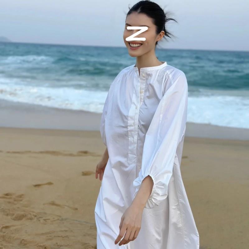 何岁同款法式白色长版衬衫洋装女春秋高级感韩版宽松超仙沙滩裙