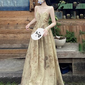 一罐杏仁桃新中式禅意吊带连衣裙