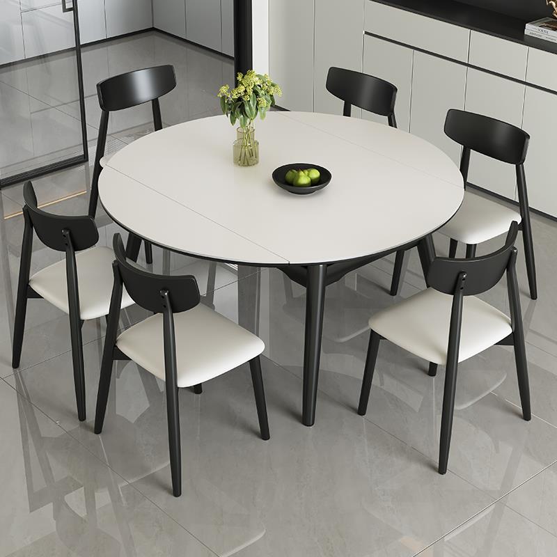 实木岩板餐桌椅组合2025新款家用小户型饭桌现代简约可变圆桌实用