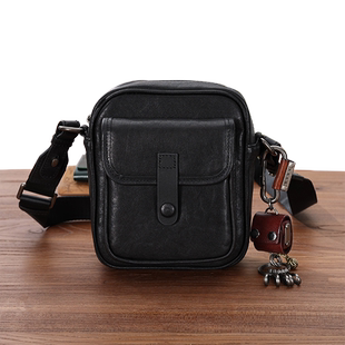 玩爷真皮斜挎包休闲单肩手机包男士出行轻便包竖款牛皮迷你小背包