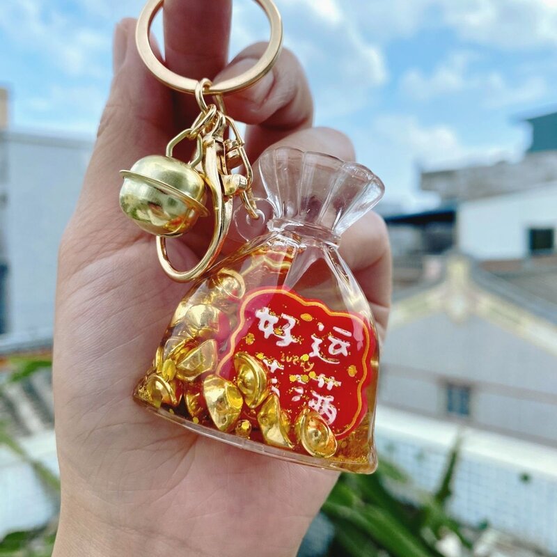 国风新款高颜值创意亚克力入油流沙招财钥匙扣书包元宝包包挂件