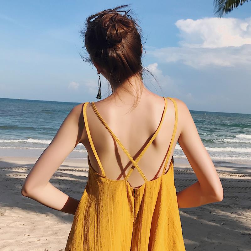旅行路上沙滩裙女夏三亚度假洋装气质浪漫旅游穿搭黄色露背长裙