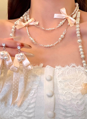 乔微爱怜蝴蝶结珍珠长款项链