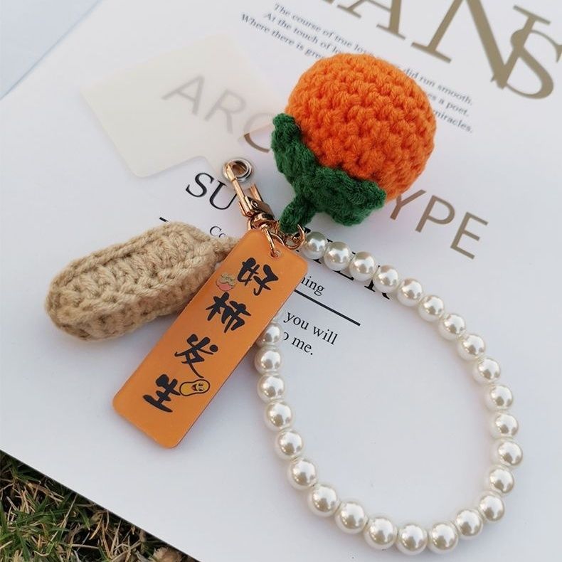 ins柿子毛球珍珠短款手机挂绳好事发生吊牌女生手机壳毛线挂饰