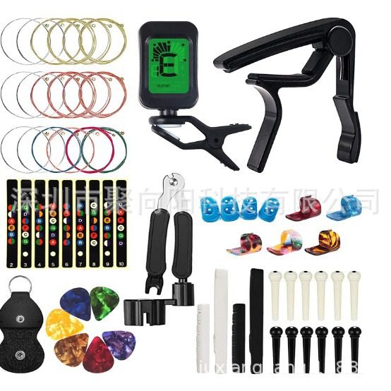 吉他配件套装音阶贴吉他弦调音器变调夹琴枕拨片三合一换弦工具