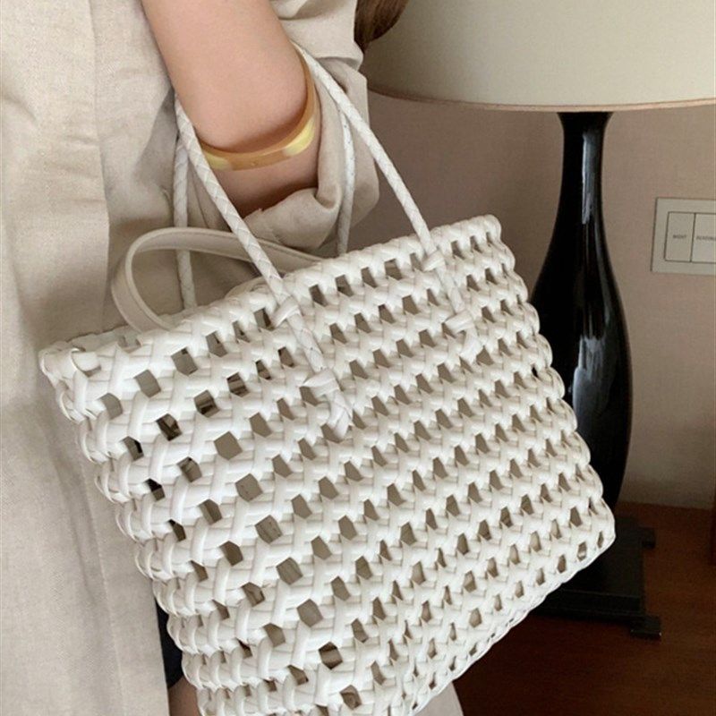 里洛家韩国新款镂空编织手提篮菜篮子包手工编织包沙滩包手提包女