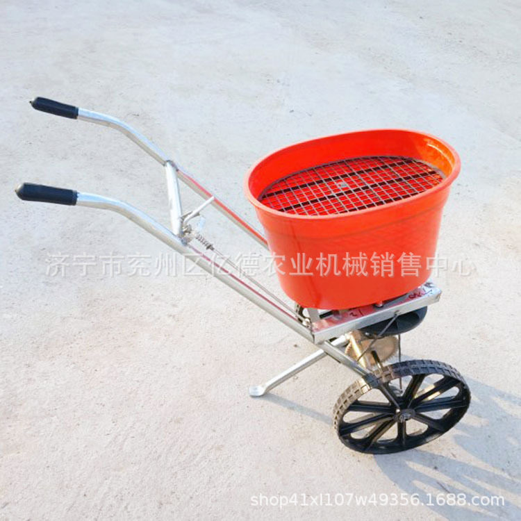 丹东热销人力撒肥车施肥机农用施肥车撒肥机手推两轮施肥车