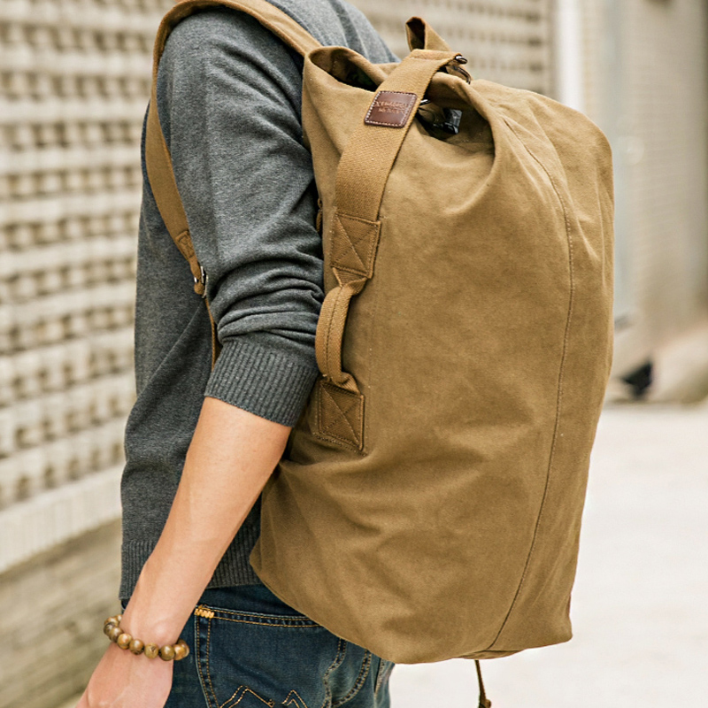 超大容量休闲双肩包轻便户外登山旅行包男士复古帆布旅游出差背包