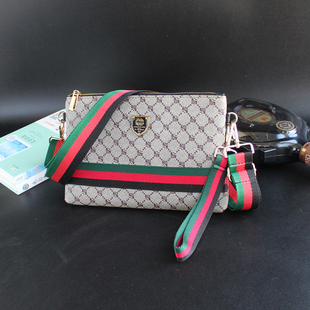 简约单肩小挎包时尚手拿包一包多用休闲包男女包新款印花斜挎包男