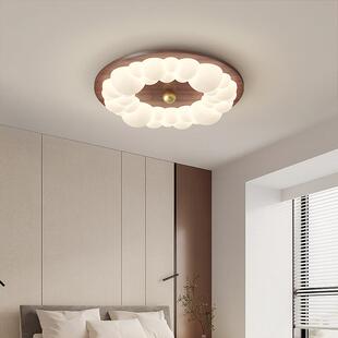 复古木纹卧室吸顶灯泡泡原木风主卧灯简约现代大气设计师房间灯具