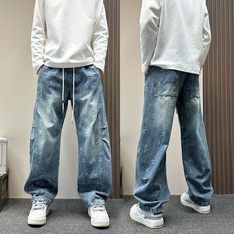 复古水洗拼接设计感牛仔弯刀裤男士春季2026新款潮牌渐变直筒长裤