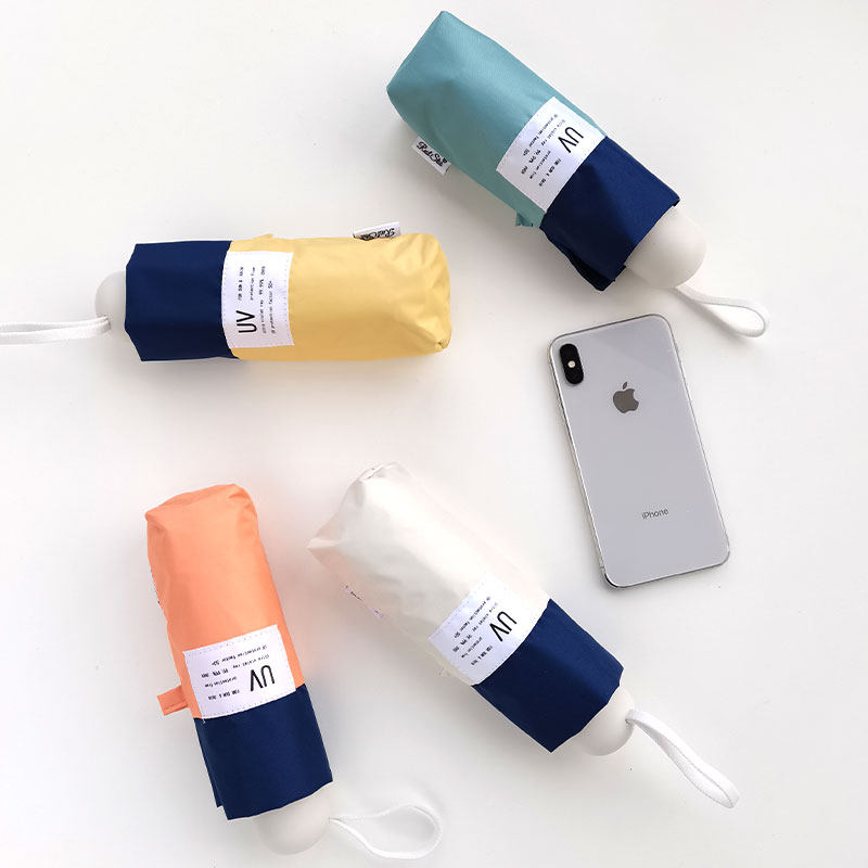 日系简约遮阳太阳防晒紫外线女小巧手动五折黑胶两用口袋胶囊伞