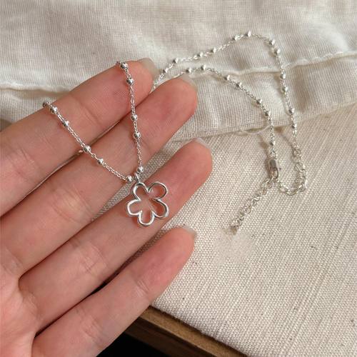 《西柚氧》甜美镂空花朵钛钢项链女轻奢小众气质高级感吊坠毛衣链