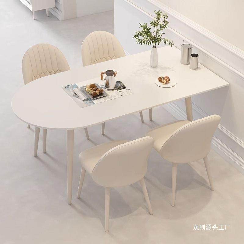 轻奢现代简约奶油风吃饭桌子椭圆形岩板餐桌小户型家用餐桌椅组合