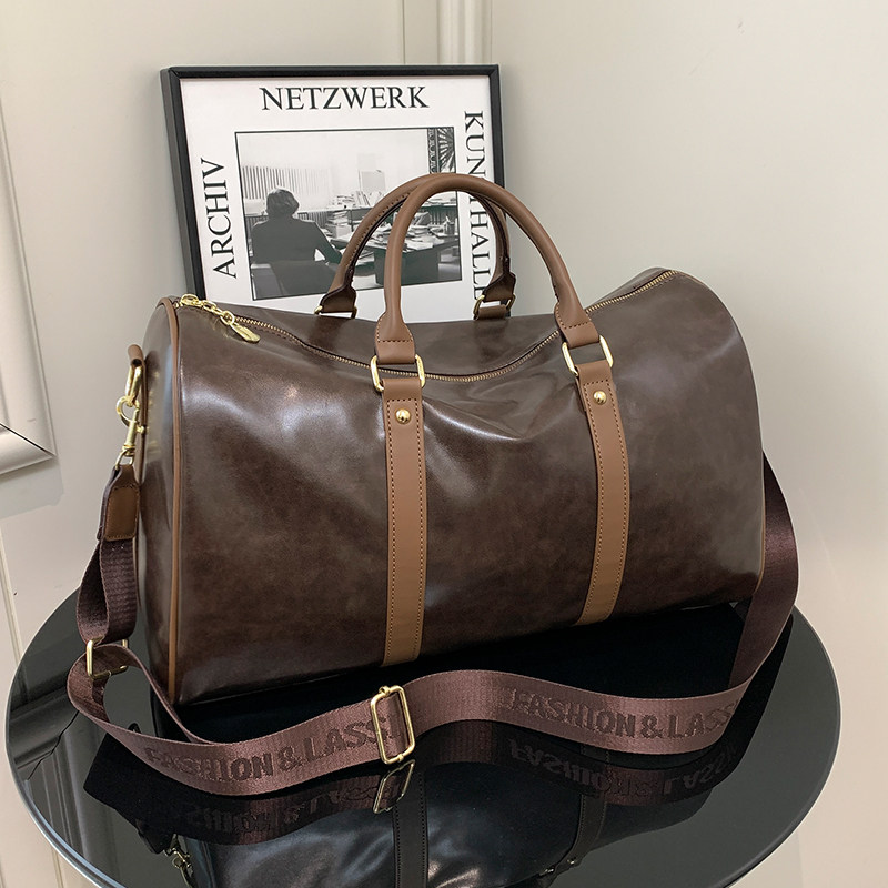短途旅行包女皮质手提轻便大容量出差收纳行李包男防水运动健身包