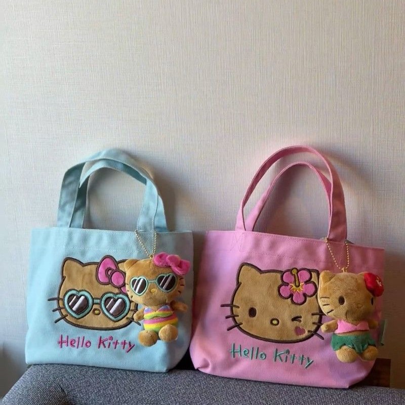 新款HelloKitty刺绣帆布包手提袋女卡通小收纳包学生可携式便当袋
