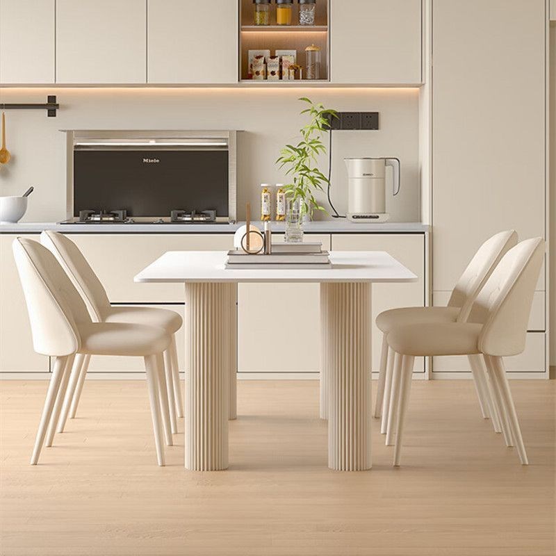 奶油风纯白岩板餐桌现代简约轻奢小户型家用长方形Y餐桌椅组合