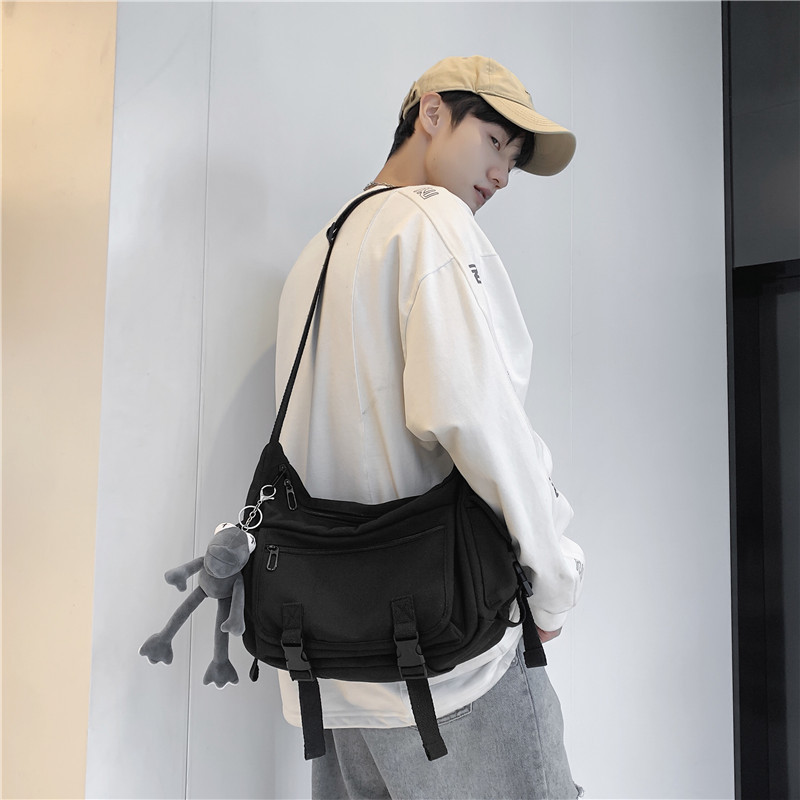 新品 简约斜挎包男女ins日系大容量机能单肩邮差包工装风大学生背