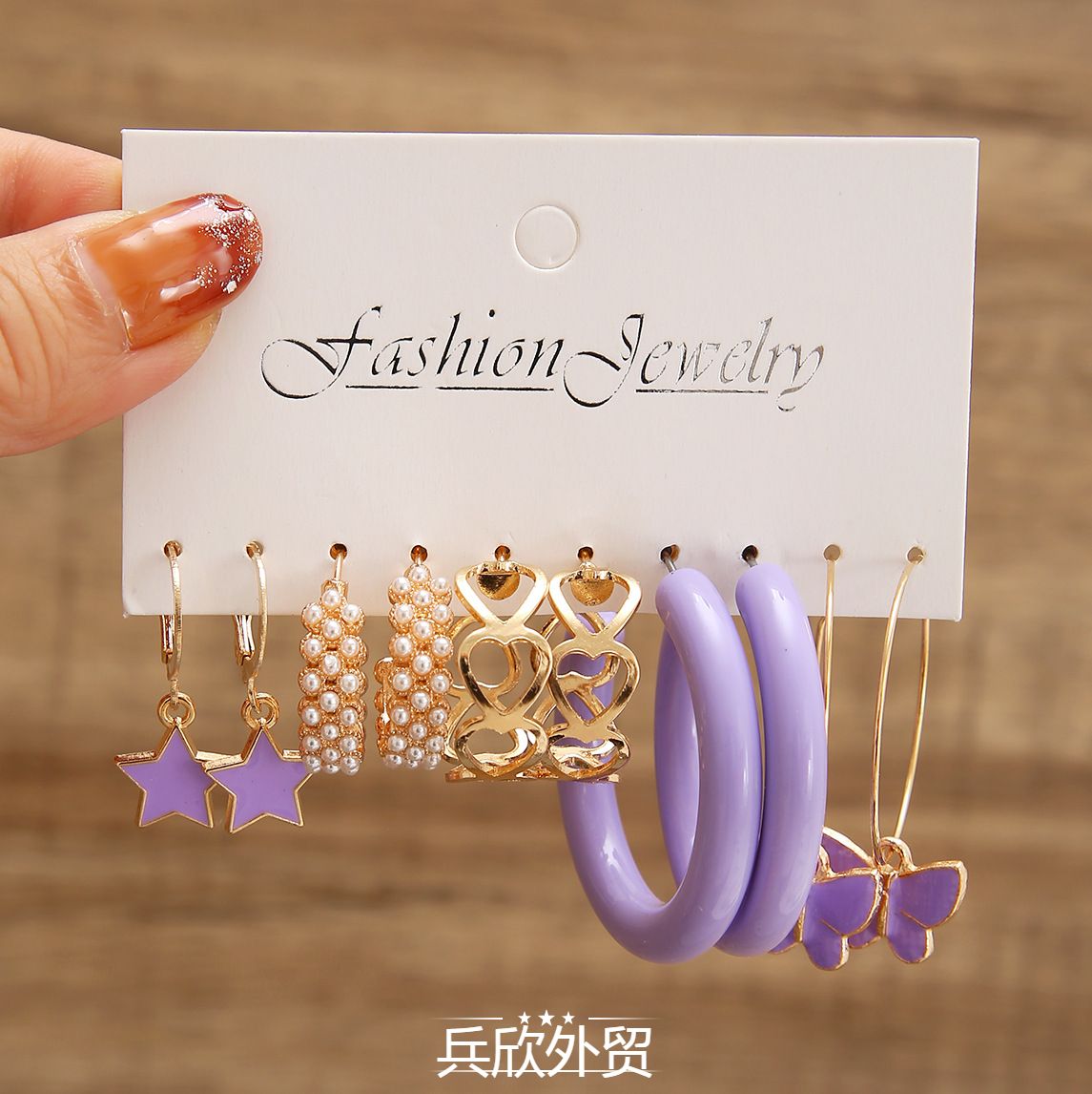 A new purple butterfly earring set with pearl jewelry耳饰