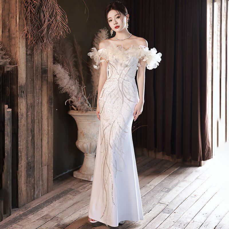 一字肩晚礼服2025新款欧美端轻奢连衣裙亮片鱼尾主持人白色礼服明